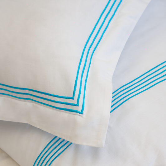 MAVİ PİKOLU TEK KİŞİLİK BEYAZ NEVRESİM TAKIMI